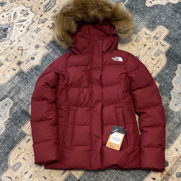 The North Face Jackets & Blazers - NWT. The North Face women’s Burgundy Puffer Jacket, size xs